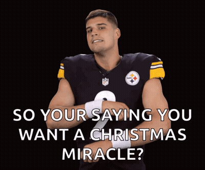 Football Player In Giants Helmet Raising Arm GIF