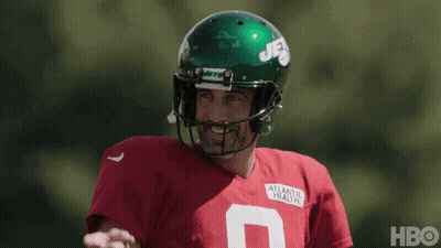 Football Player In Green Helmet And Red Jersey GIF