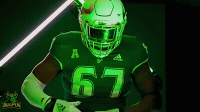 Football Player In Green Jersey Number 67 GIF