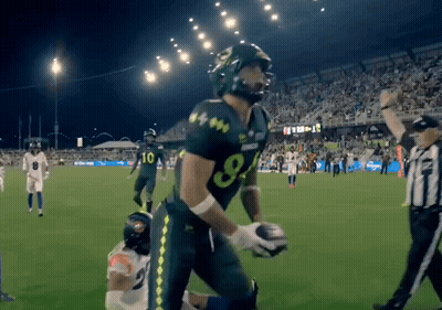 Football Player In Green Uniform Number 8 GIF