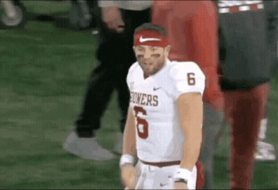 Football Player In Headband And Jersey Number 6 GIF