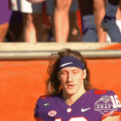 Football Player In Headband And Purple Jersey GIF