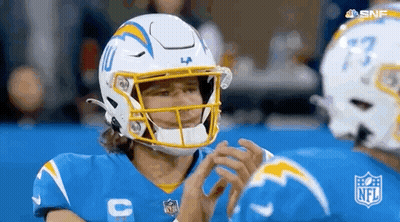 Football Player In Helmet And Blue Jersey GIF
