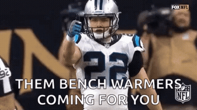 Football Player In Helmet And Gloves On Field GIF