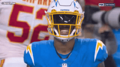 Football Player In Helmet And Goggles GIF