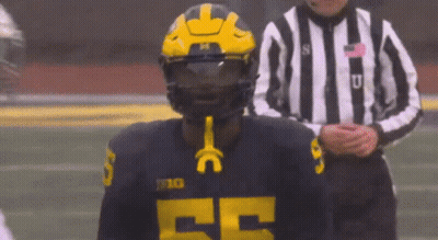 Football Player In Helmet And Jersey Number 25 GIF