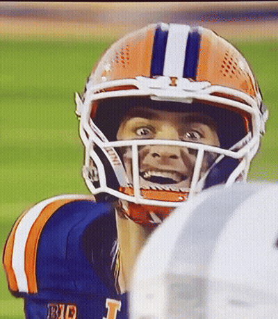 Football Player In Helmet And Jersey With Letter T GIF