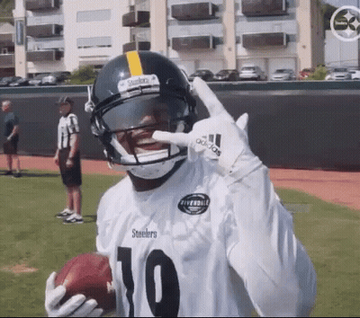 Football Player In Helmet And Number 10 Jersey GIF