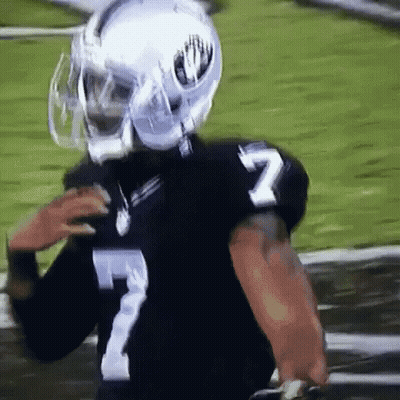 Football Player In Helmet And Number 7 Jersey GIF