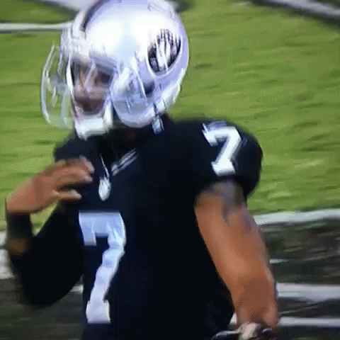 Football Player In Helmet And Number 7 Jersey GIF