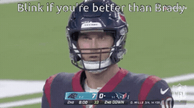 Football Player In Helmet Looking At Camera GIF