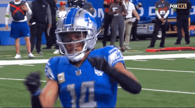Football Player In Helmet Number 10 On Field GIF