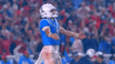 Football Player In Helmet On Field GIF
