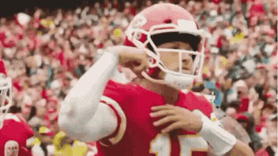 Football Player In Helmet On Field GIF