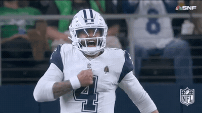 Football Player In Helmet Standing On Field GIF