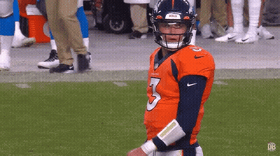 Football Player In Jersey Number 3 Standing On Field GIF