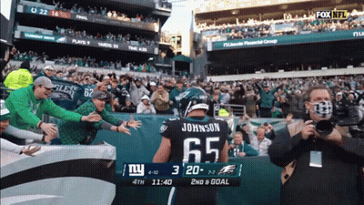 Football Player In Jersey Number 65 GIF
