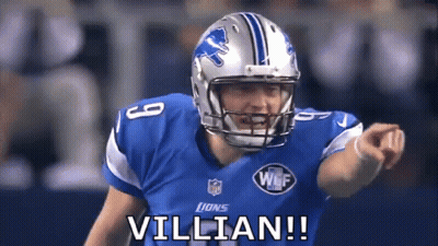 Football Player In Lions Jersey Pointing Saying Villain GIF