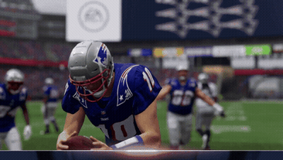 Football Player In Number 10 Jersey Holding Football GIF