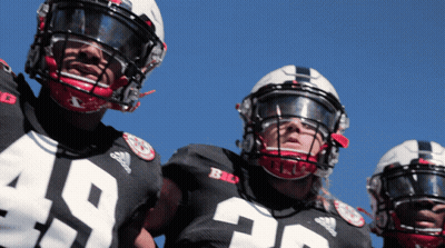 Football Player In Number 19 Jersey Next To Another Player GIF