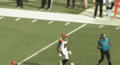 Football Player In Number 26 Jersey Running GIF