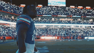 Football Player In Number 4 Jersey On Field GIF