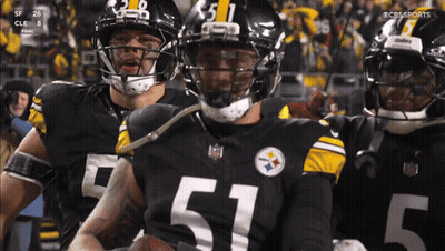 Football Player In Number 51 Jersey Holding Football GIF