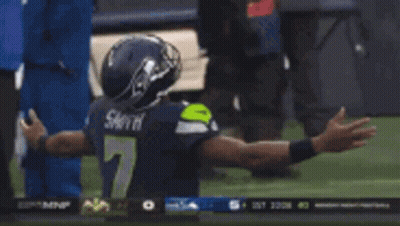 Football Player In Number 7 Jersey Kneeling GIF