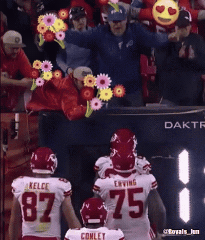 Football Player In Number 75 Jersey Next To Another Player GIF