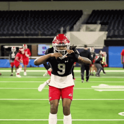 Football Player In Number 9 Jersey On Field GIF