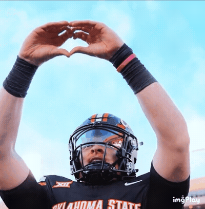 Football Player In Oklahoma State Jersey Making Heart With Hands GIF
