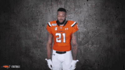 Football Player In Orange Jersey Number 21 GIF
