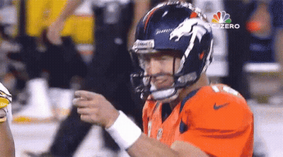 Football Player In Orange Jersey With Horse Helmet GIF