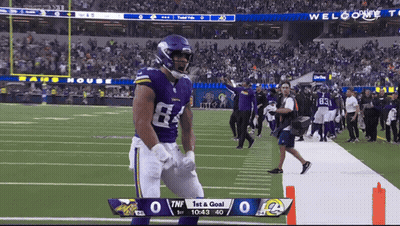 Football Player In Purple Jersey Number 64 GIF