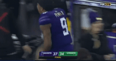 Football Player In Purple Jersey Number 9 GIF