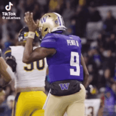 Football Player In Purple Jersey Number 9 GIF