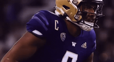 Football Player In Purple Jersey With Letter C GIF