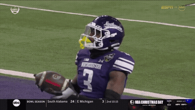 Football Player In Purple Northwestern Jersey GIF