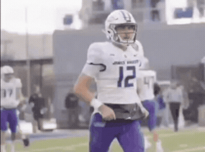 Football Player In Purple Uniform Number 10 GIF