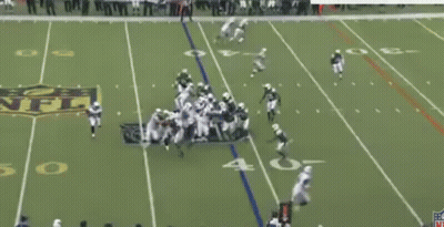 Football Player In Purple Uniform Number 18 GIF
