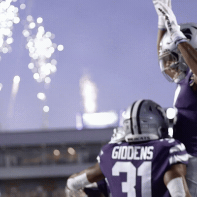 Football Player In Purple Uniform Number 31 GIF
