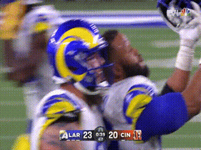 Football Player In Rams Helmet Catching Ball GIF
