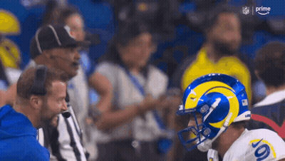 Football Player In Rams Helmet Talking To Referee GIF