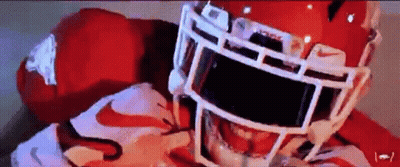 Football Player In Red Helmet Close Up GIF
