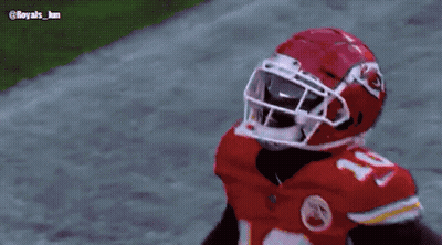 Football Player In Red Jersey And Helmet Number 17 GIF