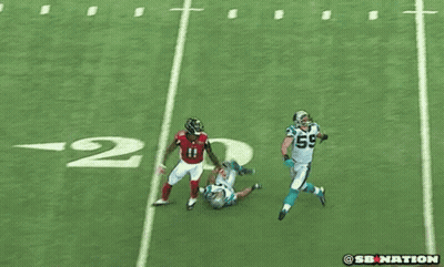 Football Player In Red Jersey Number 11 Runs Past Referee GIF