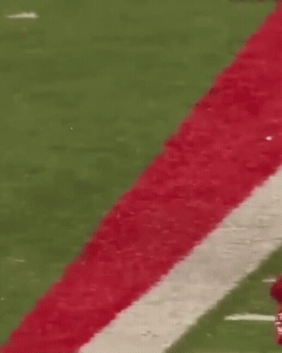 Football Player In Red Jersey Number 20 Running GIF