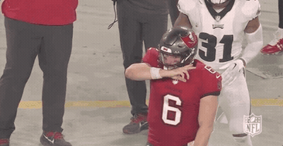 Football Player In Red Jersey Number 6 Being Tackled GIF