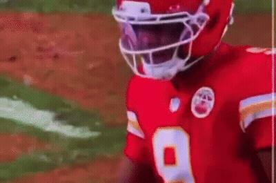 Football Player In Red Jersey Talking To Another Player GIF