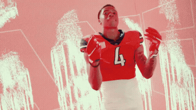 Football Player In Red Jersey With Number 4 GIF